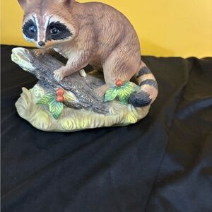 Raccoon Figurine on Log